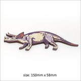 Colorful pine veneer wall art set featuring various dinosaurs, perfect for inspiring kids' creativity and room decor.