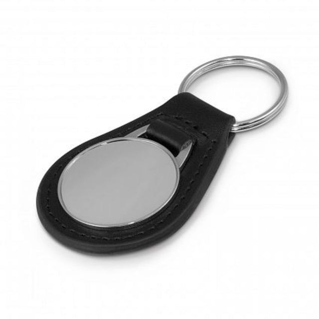 Set of 12 elegant black leather key rings with round metal plates, presented in a sleek gift box for stylish organization.