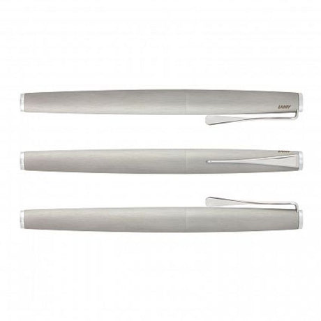 Elegant Lamy Studio Rolling Ball Pen in brushed silver with propeller clip, chrome accents, and smooth black ink refill.