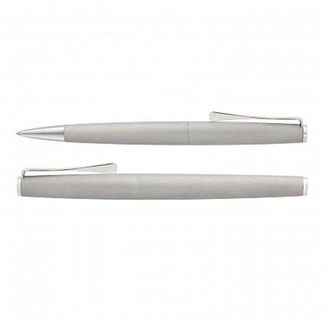 Lamy Studio Pen Set in brushed silver, featuring a twist ballpoint and rolling ball pen with chrome accents, elegantly boxed.