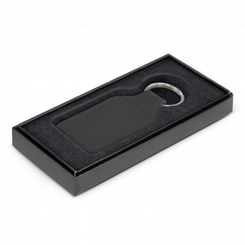 Elegant black leather square key ring with matching stitching, packaged in a gift box, perfect for gifting or stylish organization.