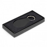 Round black leather key ring with matching stitching, elegantly presented in a black gift box for stylish organization.