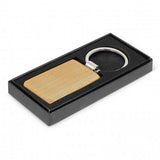 Natural beech wood rectangle key rings set of 12 with metal trim, presented in a sleek black gift box.
