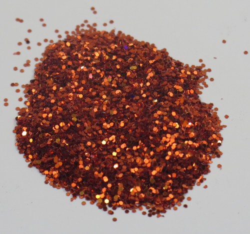 Vibrant apricot-colored Das Glitter in 250gm, perfect for crafting, scrapbooking, and DIY projects with a beautiful sparkle.