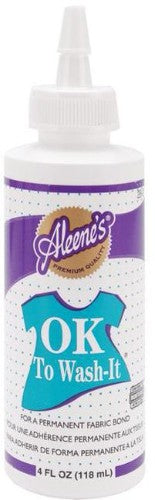 Aleene's 28-2 Ok To Wash It 4oz glue for fabric crafts, offering a clear, washable bond suitable for various materials.