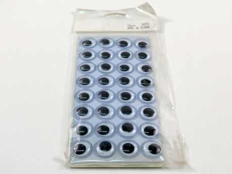 Pack of 32 self-adhesive 15mm moving eyes for crafts, perfect for adding character to projects like puppets and decorations.