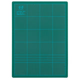 Green Crayon cutting mat, 300x220mm, 3mm thick, gridded, self-healing design for precise crafting and cutting.