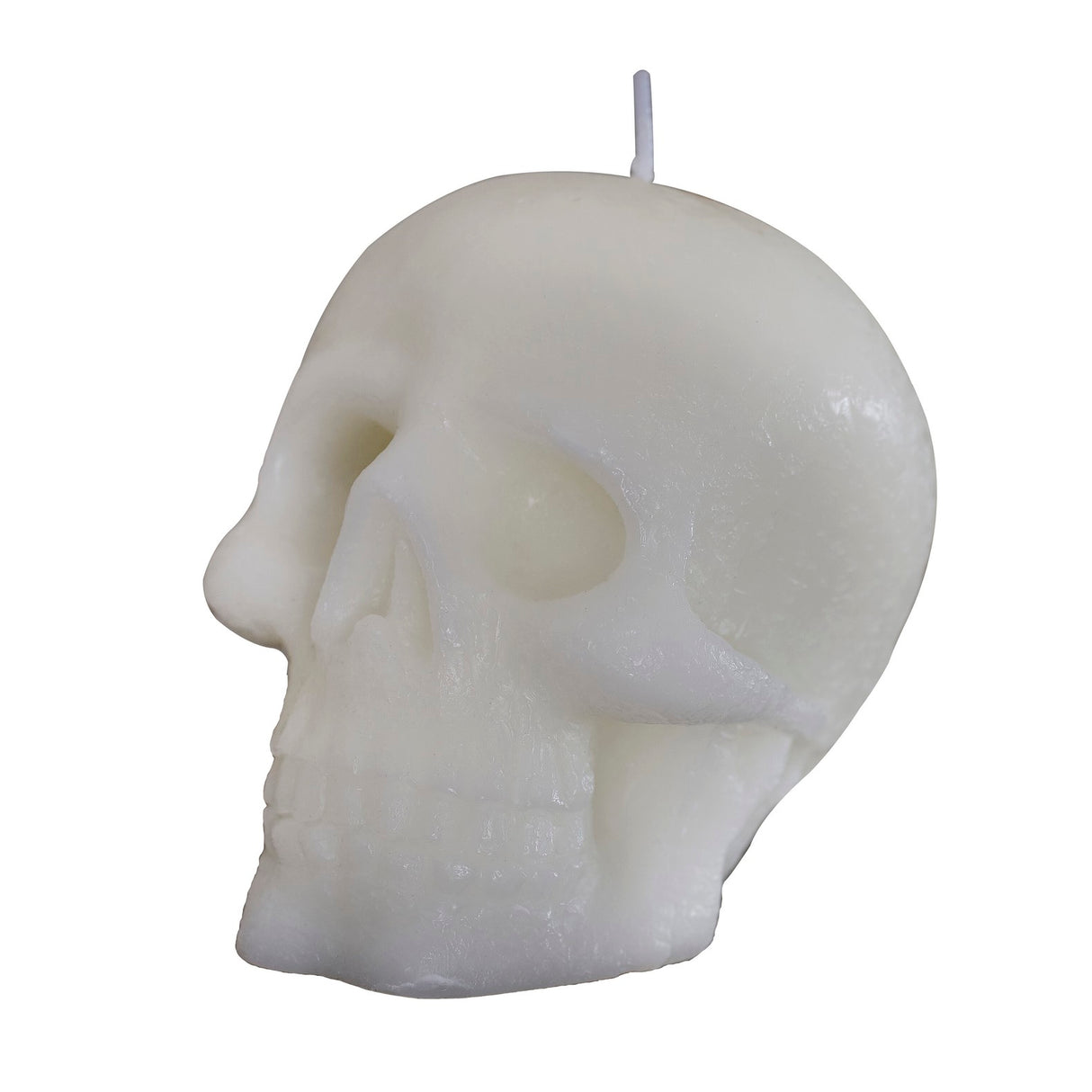 White skull-shaped candle (11cm) for Halloween, combining elegance and spookiness in eco-friendly packaging.