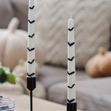 Dinner candles featuring 3D bats, perfect for spooky Halloween decor and creating an enchanting ambiance.