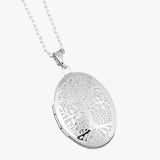 Equilibrium Tree of Life Locket, silver-plated, symbolizes growth and strength; safe for sensitive skin and versatile in style.