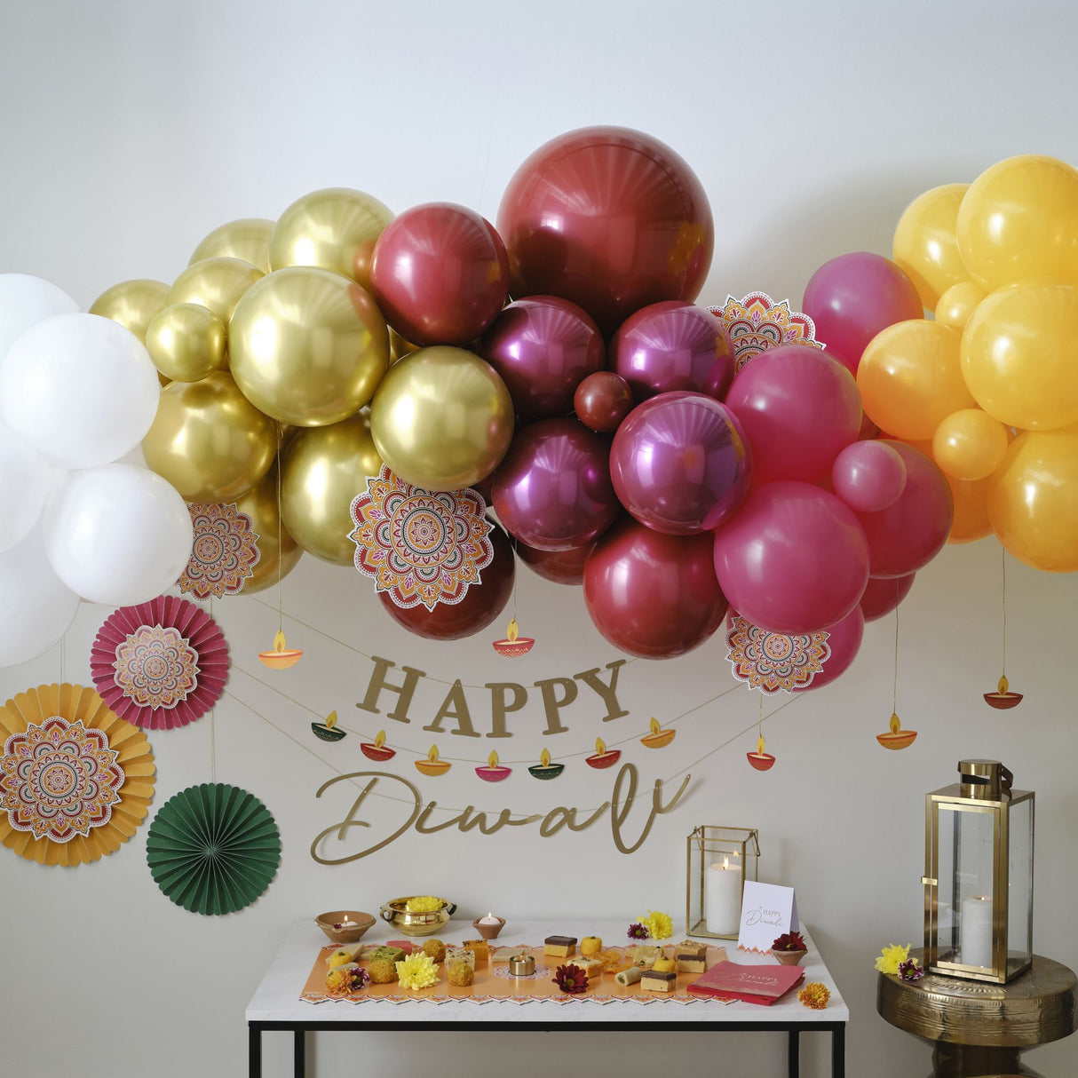 Vibrant Balloon Arch Kit for Diwali, featuring rangoli patterns and eco-friendly balloons in festive colors for memorable celebrations.