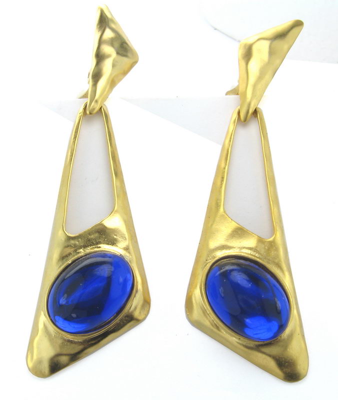 Matt gold earrings featuring vibrant blue stones, perfect for elevating any outfit with elegance and charm.