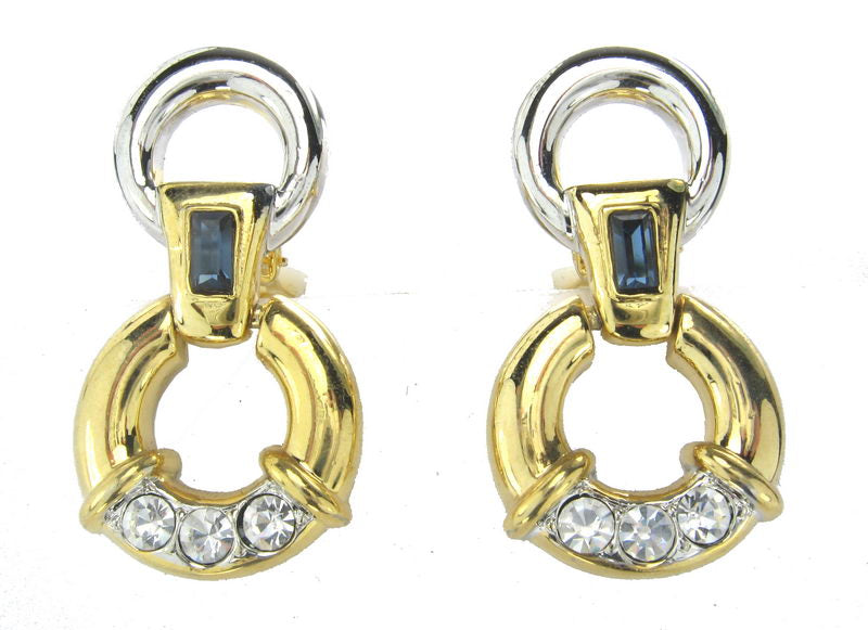 Elegant gold earrings with rhodium finish and radiant blue stone, perfect for any occasion and adding glamour to your look.