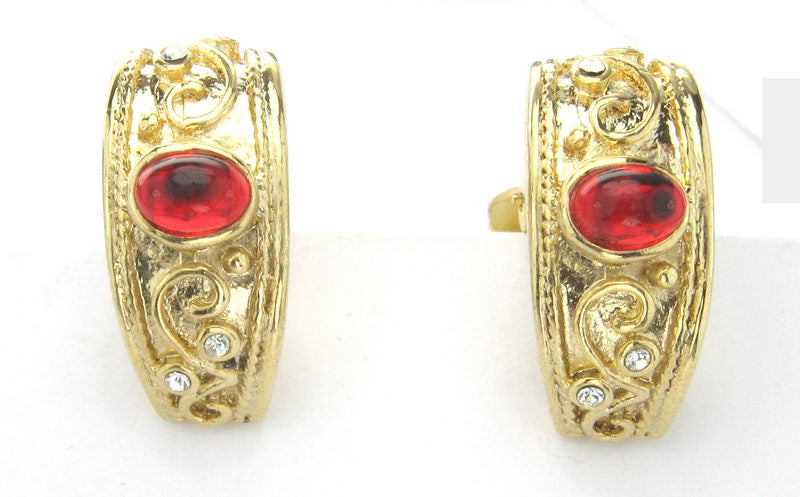 Gold earrings with a vibrant red acrylic stone, perfect for elevating any outfit with modern elegance.