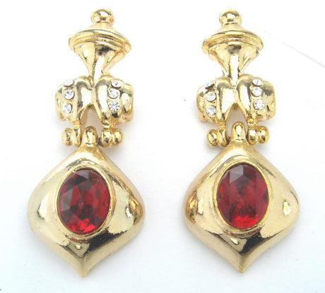 Gold plated earrings with a vibrant red stone, perfect for adding elegance and glamour to any outfit.