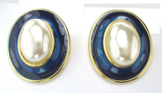 Cream pearl earrings with vibrant blue enamel, offering elegance and versatility for any occasion.