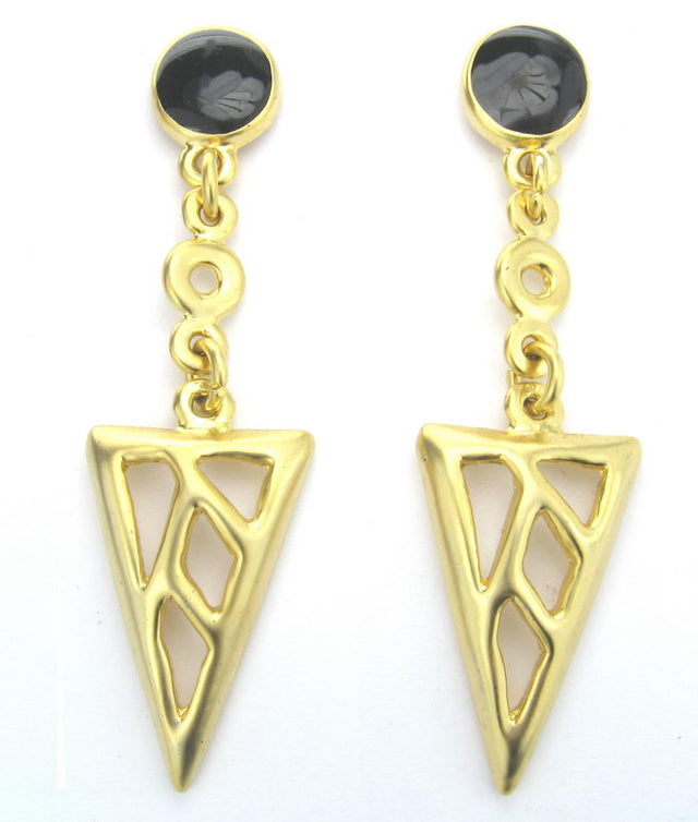 Elegant gold earrings with striking black enamel, perfect for elevating both casual and formal outfits.