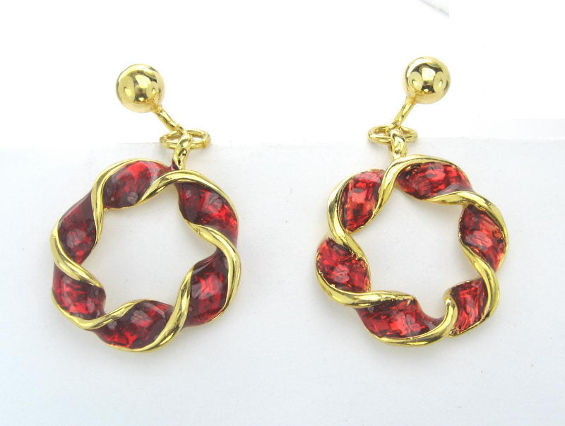 Elegant gold earrings featuring vibrant red enamel, perfect for both casual and formal occasions.