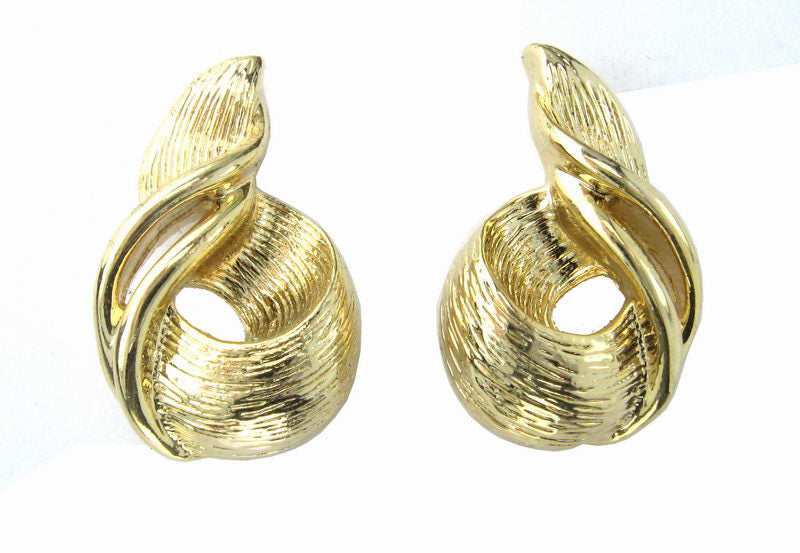 Elegant gold earrings in various styles, perfect for enhancing any outfit and suitable for special occasions or everyday wear.