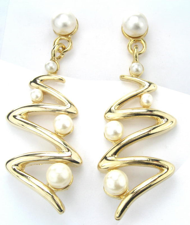 Elegant gold and pearl earrings set, perfect for any occasion, showcasing sophistication and timeless charm.