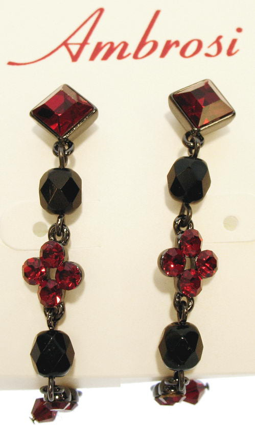 Stunning red earrings featuring a diamond top, drop design, Swarovski elements, and a striking jet glass stone.