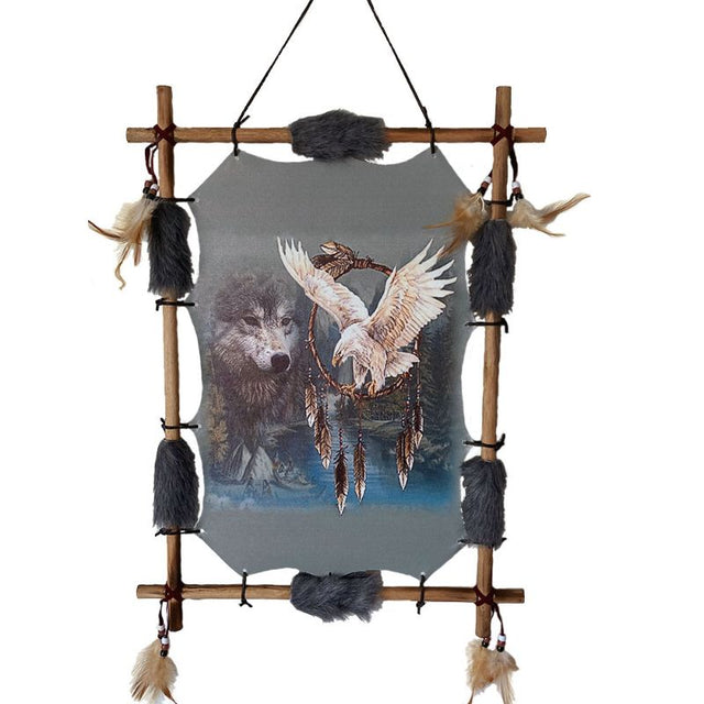 Bohemian dreamcatcher featuring an eagle and wolf motif, bamboo frame, faux fur edges, and tonal feathers for protection and spirituality.