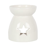 Elegant white ceramic oil burner with star cut-outs, perfect for creating a cozy ambiance while diffusing delightful scents.