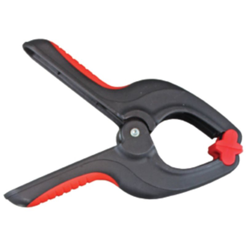 Trademaster Spring Clamp with 32mm capacity, durable plastic, soft rubber handle, ideal for woodworking and DIY projects.