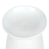 Elegant white ceramic oil burner featuring a detailed Tree of Life design, perfect for enhancing ambiance with soothing scents.