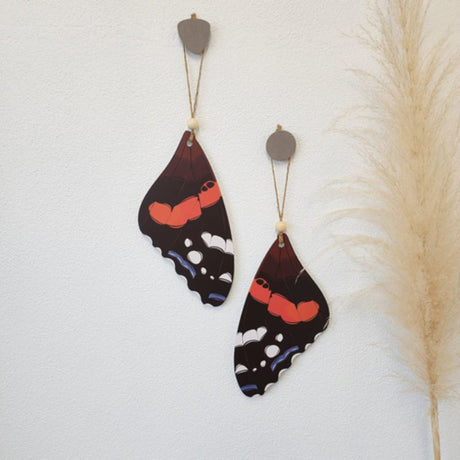 Hanging ornament featuring a vibrant Red Admiral butterfly design, perfect for home decor and nature enthusiasts.