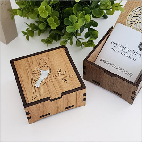 Elegant square trinket box with mother of pearl inlay, crafted from NZ veneer, perfect for storing jewelry and keepsakes.