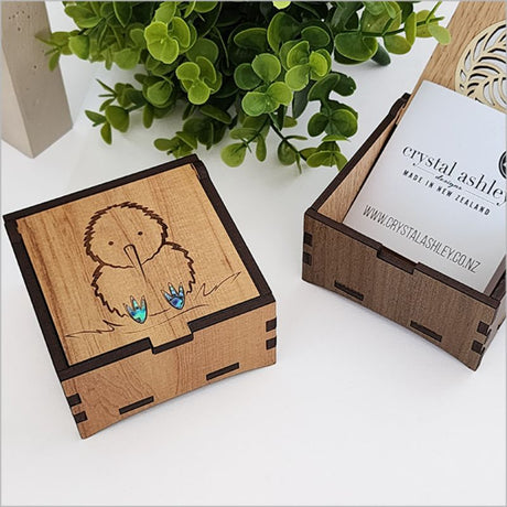 Square trinket box featuring a kiwi design, crafted from NZ veneer with Paua inlay, perfect for jewelry and mementos.