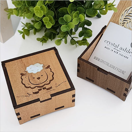 Charming square trinket box featuring a sheep design, inlaid with mother of pearl, perfect for storing small treasures.
