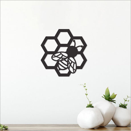 Black acrylic bee wall art, 10.8cm size, perfect for modern decor; elegant design for any room or as a thoughtful gift.