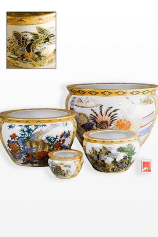 Set of 4 assorted hand-painted ceramic vases in unique designs, perfect for flower displays or decorative arrangements.