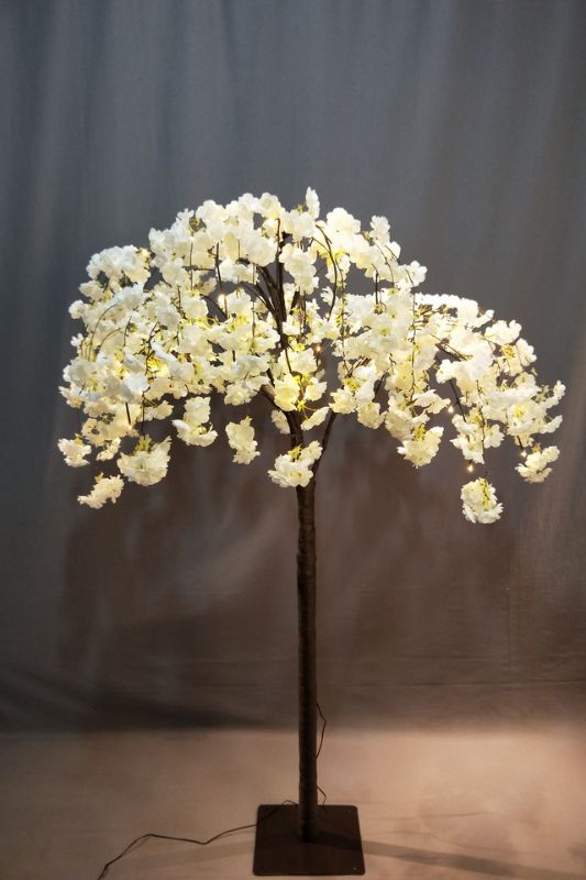 Set of 2 elegant cherry blossom trees, 170cm tall, adorned with 84 warm white LED lights for enchanting home decor.