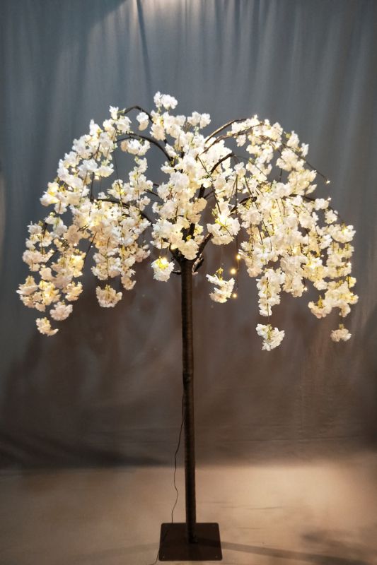 Light pink cherry blossom tree with 144 warm white LEDs, standing 210cm tall, perfect for elegant decor and ambiance.