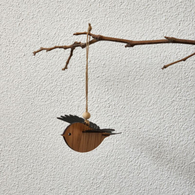 Hanging ornament of a charming New Zealand Robin, crafted from Rimu Veneer with 3D polypropylene wings, perfect for home decor.