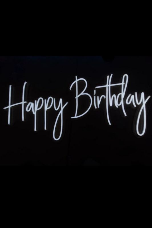Neon LED 'Happy Birthday' sign in white, measuring 1000mm x 462mm, perfect for adding festive ambiance to birthday celebrations.