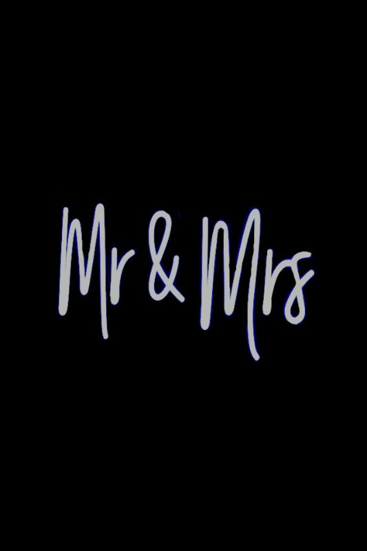 White Neon LED 'Mr & Mrs' sign, perfect for weddings and celebrations, features a romantic glow and versatile mounting options.