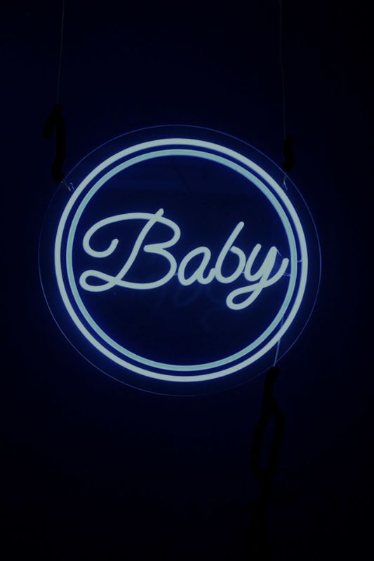Light blue 'Baby' neon LED sign, 500mm diameter, perfect for nurseries and events, includes transformer and extension cord.