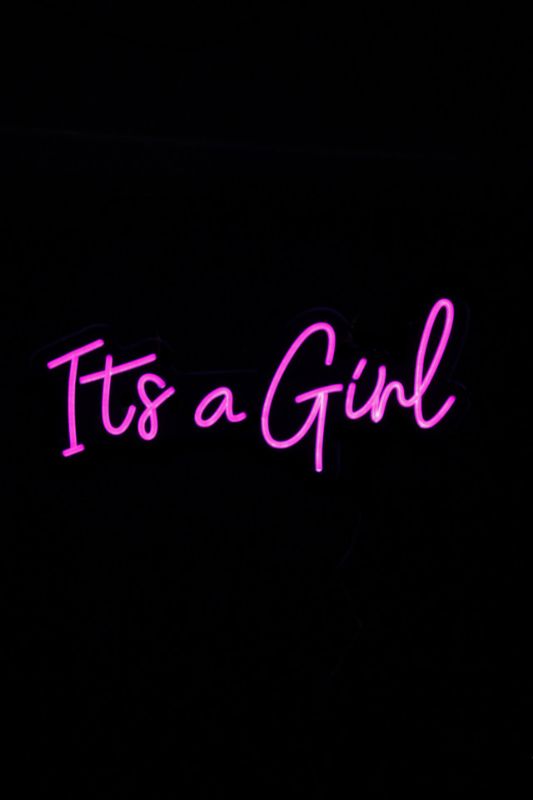 Bright pink neon 'It's a Girl' sign perfect for baby showers, nurseries, and gender reveals, measuring 780x365mm.