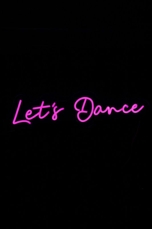 Bright cerise Neon LED sign that reads "Let's Dance," perfect for adding fun to parties and home decor.