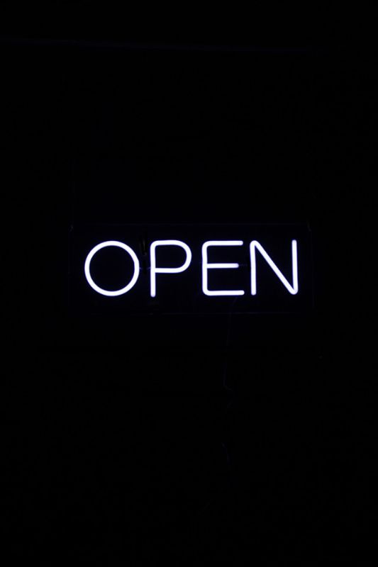 White Neon LED 'OPEN' sign, wall-mounted, 620x240mm, perfect for inviting customers to shops, cafes, and restaurants.