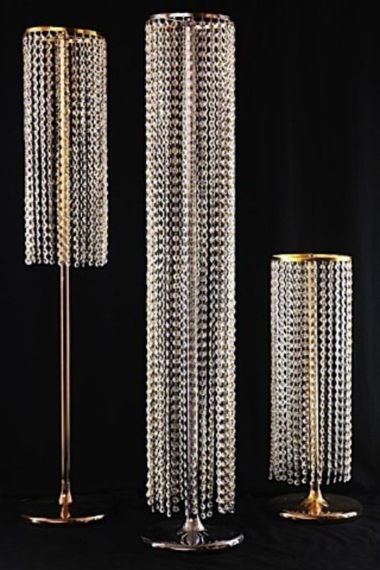 Elegant gold glass display tower, 121cm high, perfect for showcasing collectibles or plants in style.