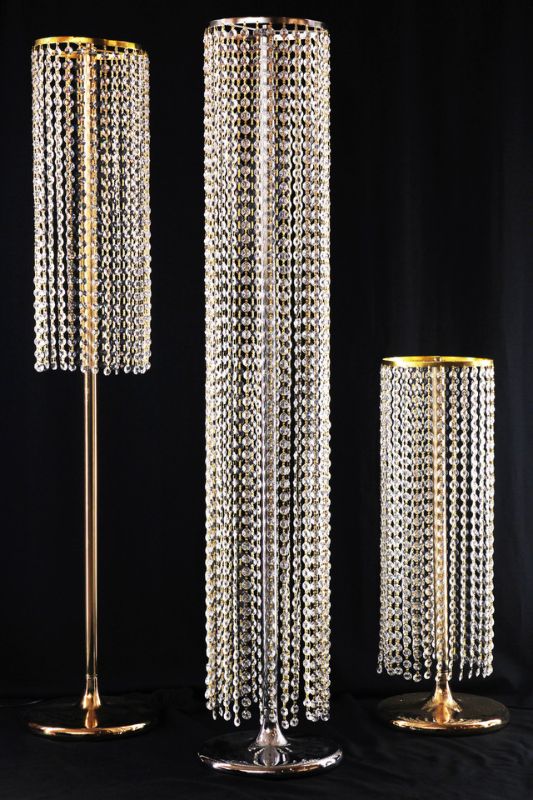 Tall gold crystal tower decor, 22D x 121cmH, radiating elegance and luxury for modern and classic interiors.