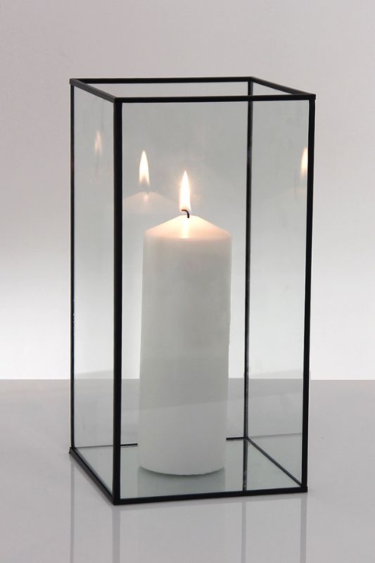 Set of 6 black metal frame glass candle boxes with mirrored bases, ideal for elegant candle displays and decor.