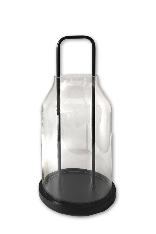 Elegant clear outdoor candle holder with a chic matt handle, perfect for creating a warm glow at any gathering.