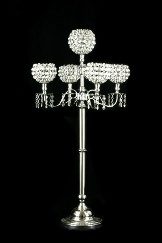 A pair of silver chrome candelabras adorned with acrylic beads, perfect for elegant decor and candle lighting.