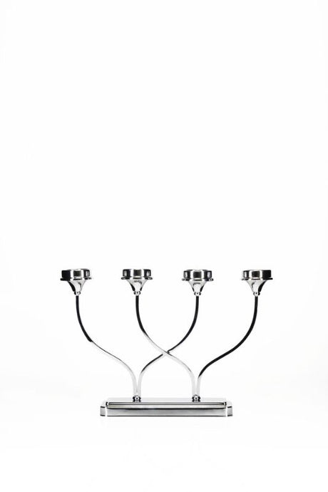 Elegant silver 4 arm candle holder, perfect for creating ambiance and enhancing home decor with modern sophistication.